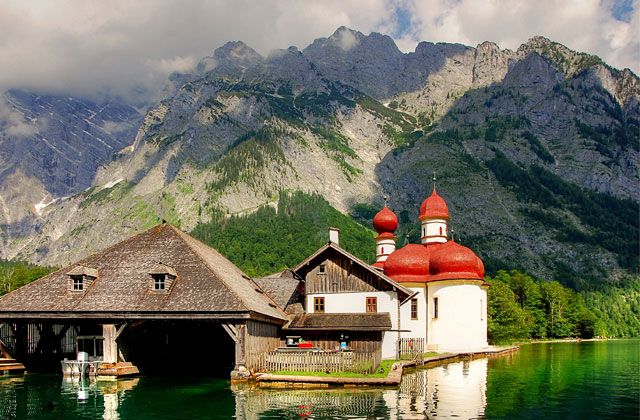 Timber building against the mountains